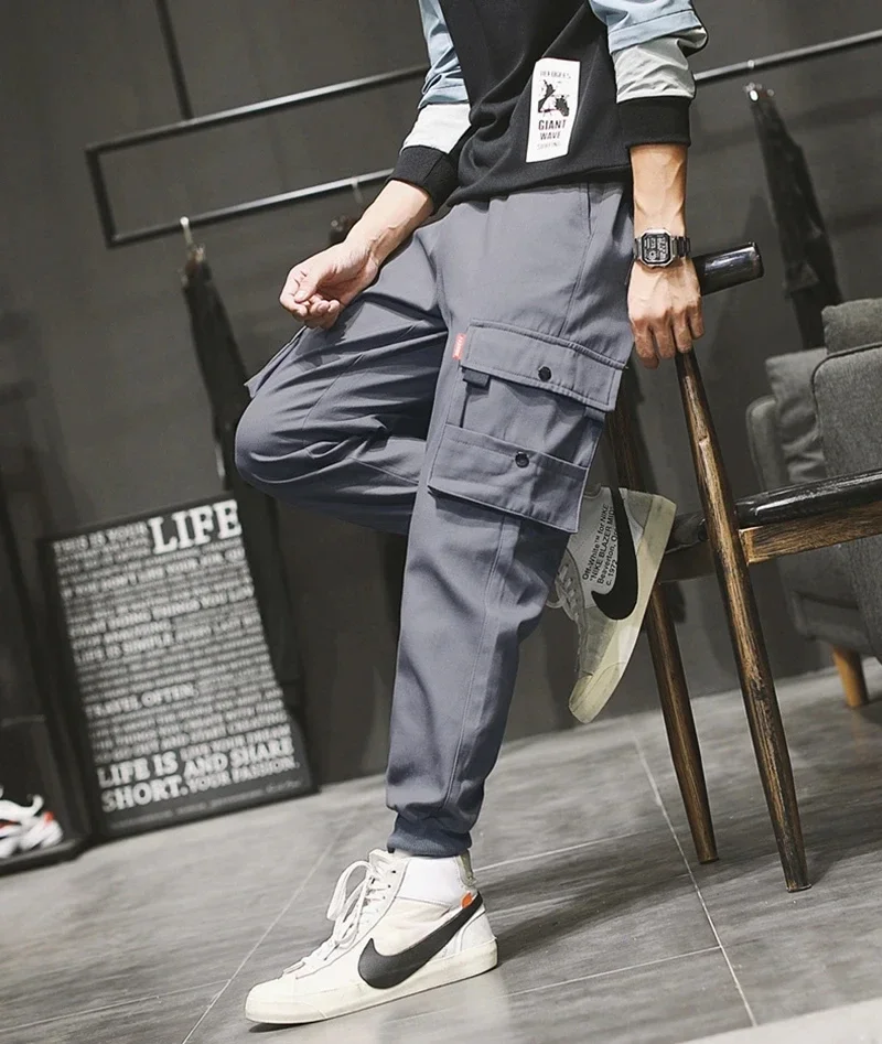 

Overalls men's summer nine minutes casual pants fashion brand loose pants men's version of the all-purpose binding pants men's t