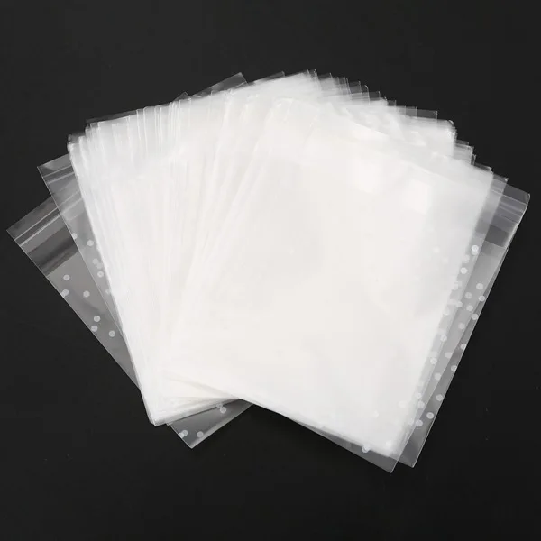 100 stücke transparente Zellophan-Bonbon tüten aus Kunststoff selbst klebende weiße Tupfen-Bonbon-Keks-Geschenkt üten für die Hochzeits geburtstags feier – Detail 2