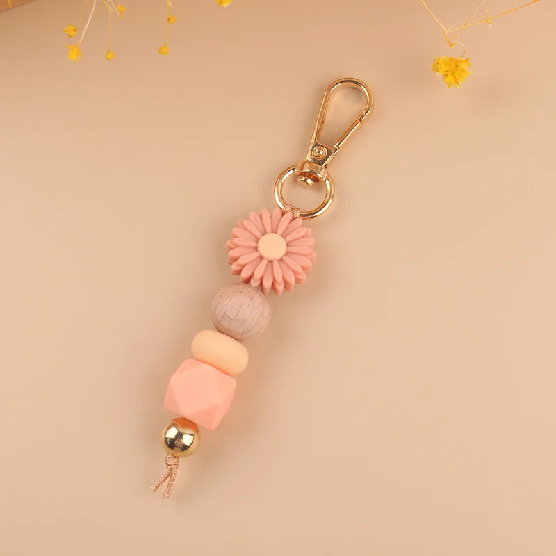 Kreative Silikon Daisy Perlen Schlüsselbund Diy Handgemachte Holz Perlen Schlüssel Ketten Für Frauen Mädchen Tasche Anhänger Schlüssel Zubehör Schlüsselring G – Detail 7