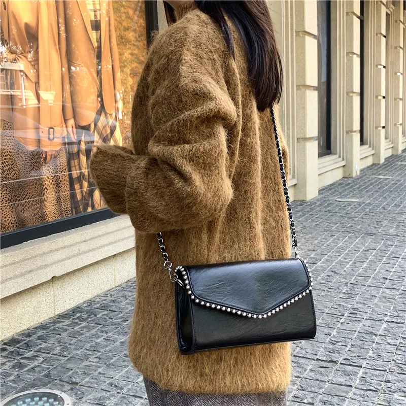 zara crossbody bag with embossed chain