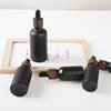 20/30X Frosted Black Bamboo Cap Glass Dropper Bottle Essential Oils 5ml-100ML Glass Dripper Portable Refillable Travel Bottle 1