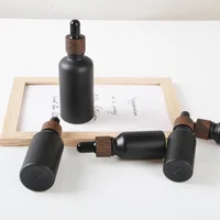 20/30X Frosted Black Bamboo Cap Glass Dropper Bottle Essential Oils 5ml-100ML Glass Dripper Portable Refillable Travel Bottle 1