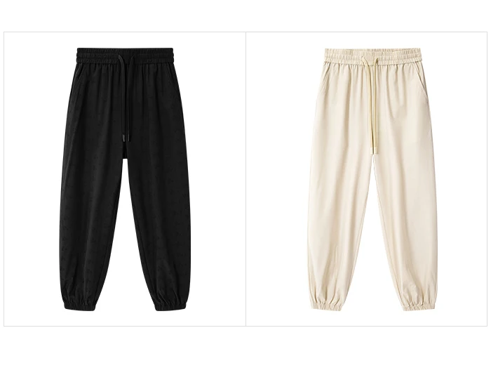Pantalones casuales para mujer diseñados con un toque de textura. Pantalones cónicos de jacquard con estampado oscuro y un ajuste único y holgado.