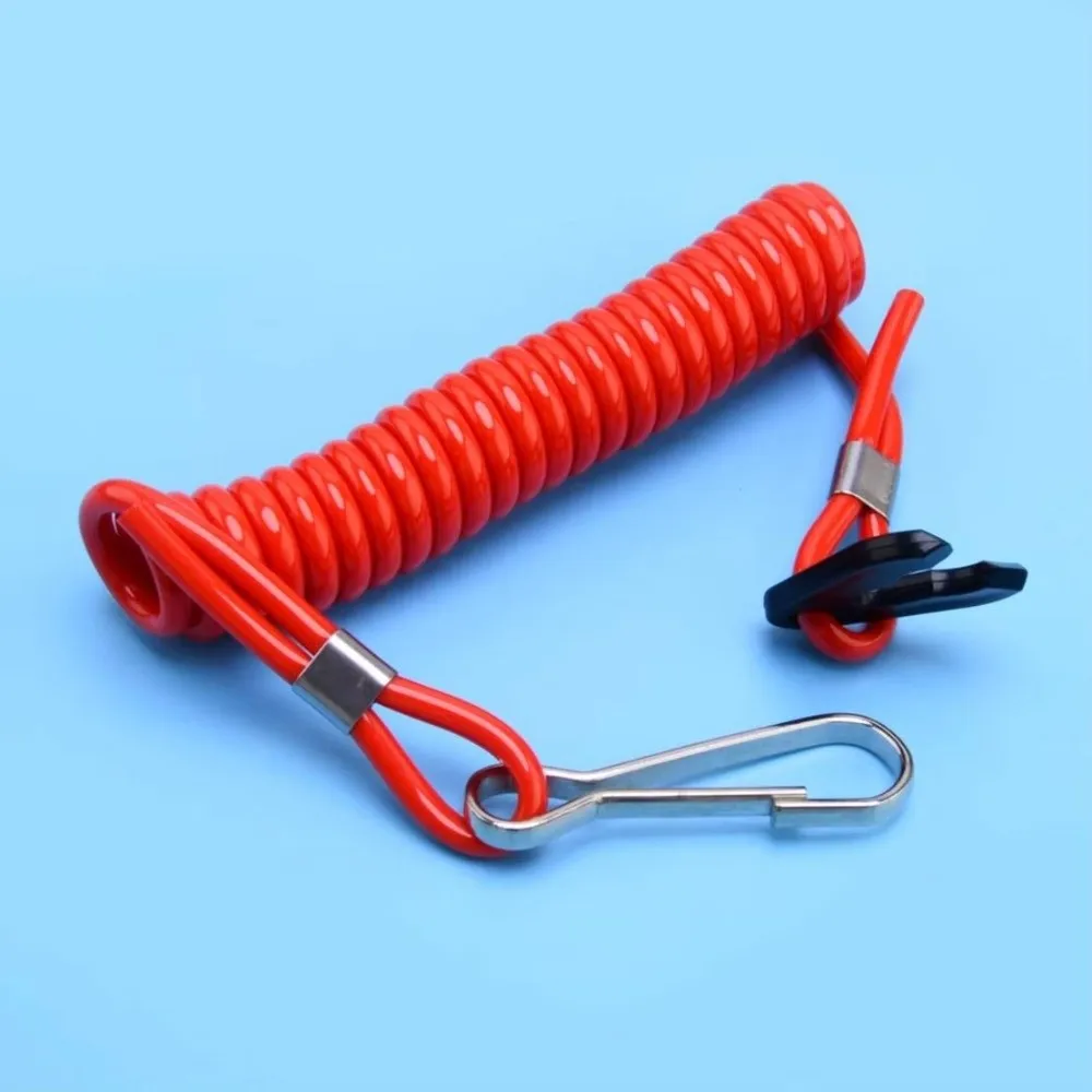 Détail de la lanière de sécurité rouge enroulée autour de l'interrupteur d'arrêt pour moteur hors-bord.