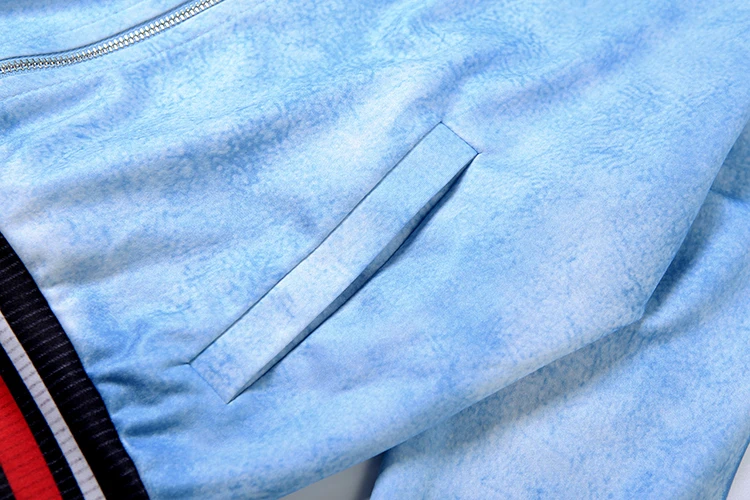 women zip-up tracksuit set side view