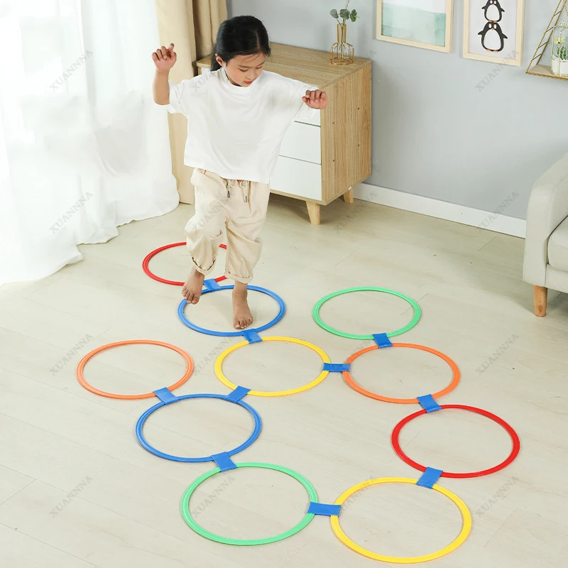

Hopscotch Game Outdoor Games for Kids 10 Plastic Rings and 10Connectors 1 Bean Bags Indoor Outdoor Game Obstacle Course Training