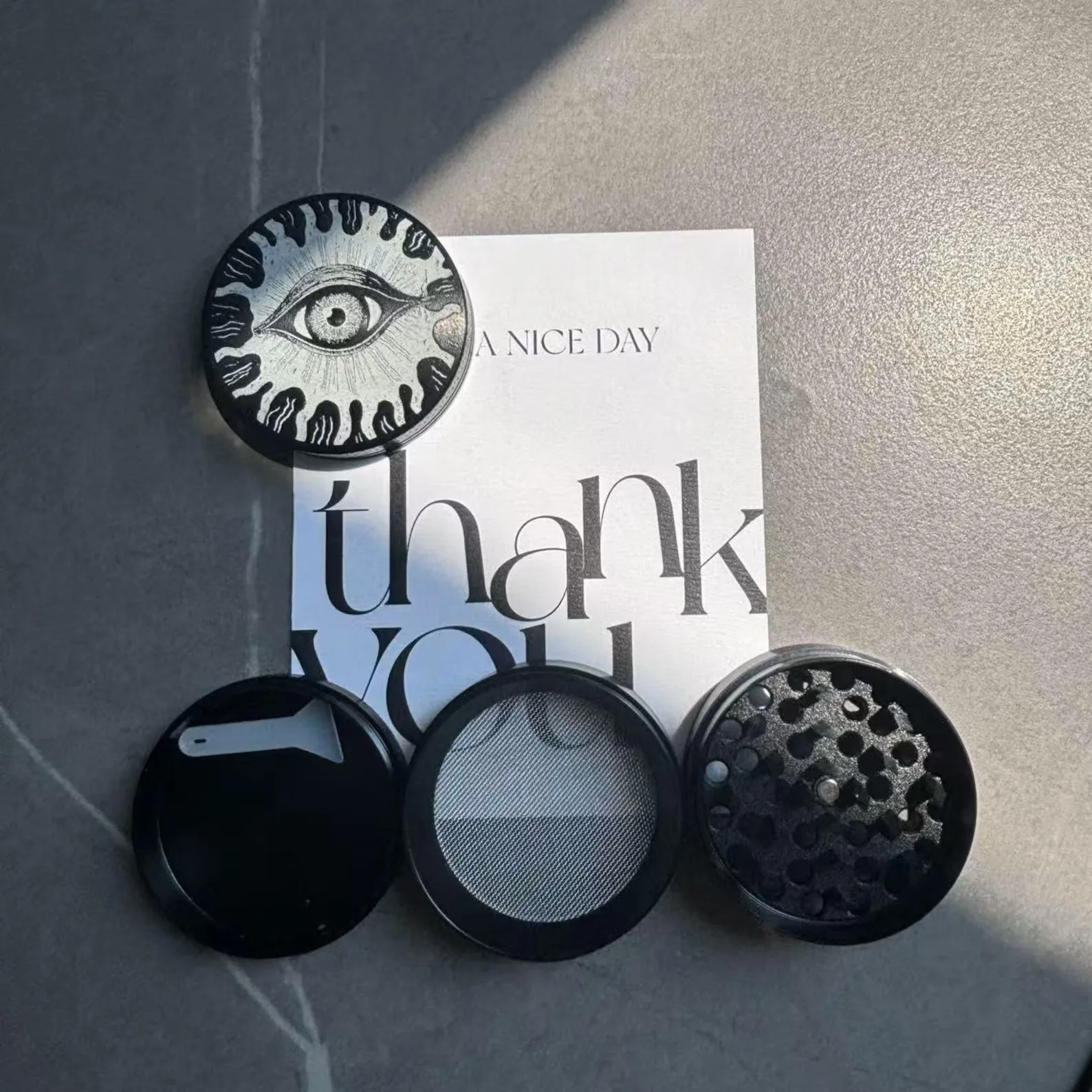 Sleek Black Zinc Alloy Herb Grinder - 2-inch