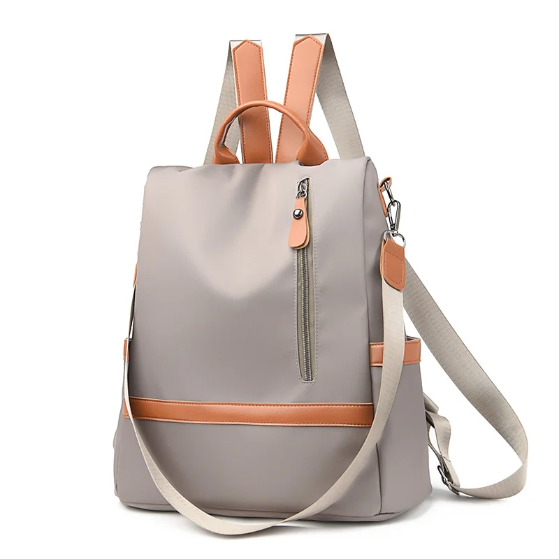 Women's fashionable black Oxford backpack, a versatile and spacious day bag suitable for travel, school or leisure outings, trav