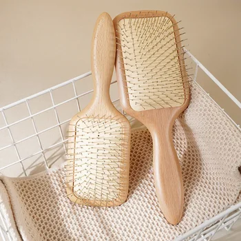 Spazzola per capelli districante in legno con perni a sfera in acciaio antistatico e cuscino d'aria per ottenere una sensazione di massaggio del cuoio capelluto fresca e rinfrescante 1