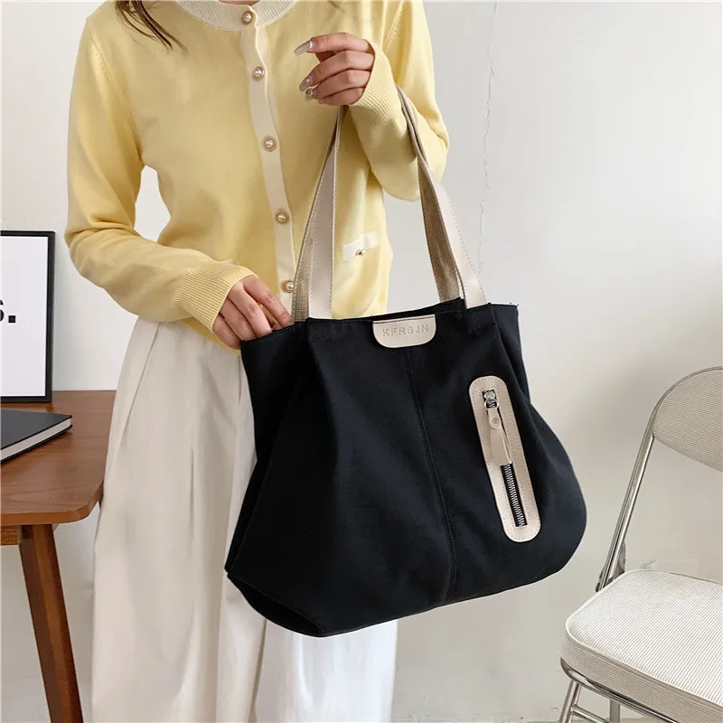 

Large Capacity New Women's One-Shoulder Canvas Commute Leisure Women's Simple All-Match Student Hand Holding Schoolbag