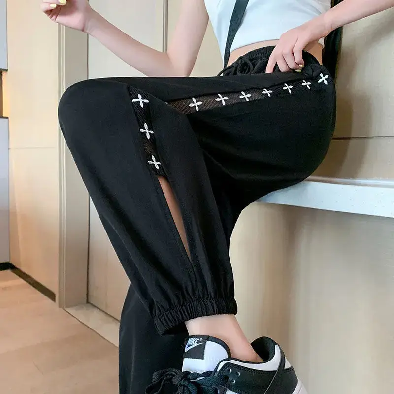 2023 New Summer Fashion Trend Mesh Hollowed Out Print Quick Drying Loose Casual Leggings Thin Cropped Women's Casual Pants