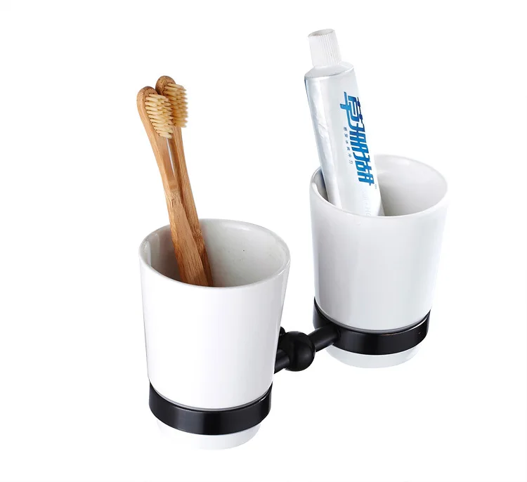 Portaspazzolini in ceramica e bicchiere da bagno in vetro trasparente_voghion.com