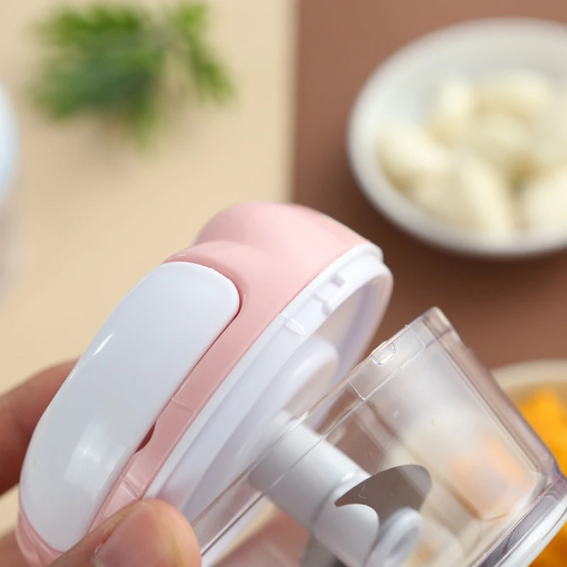 https://ae01.alicdn.com/kf/S8f68605ec4144864bf02141aabd38057R/Multifunctional-Mini-Garlic-Chopper-Onion-Garlic-Press-Hand-pulled-Meat-Grinder-Shredder-Hitter-Household-Kitchen-Gadget.jpg