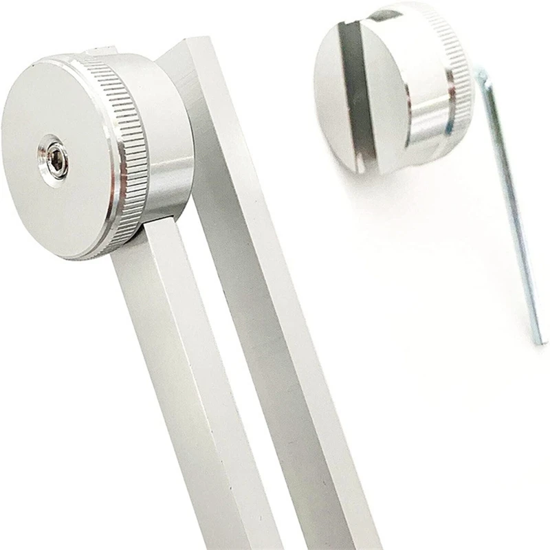 Therapy tuning fork in hand