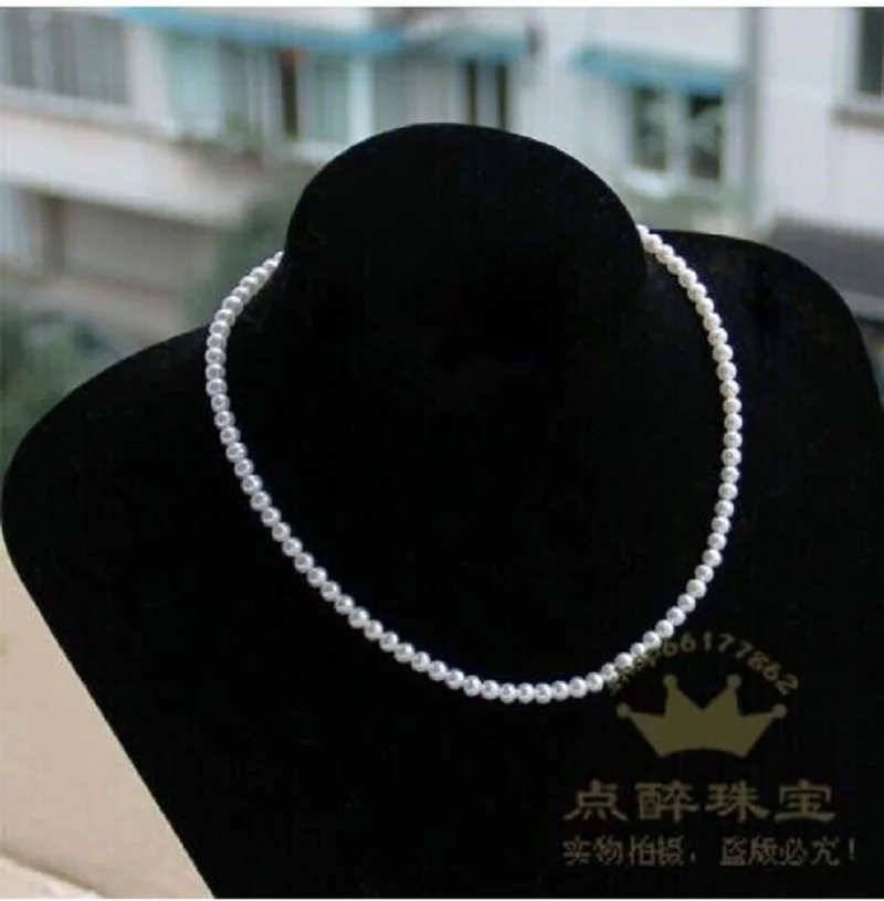 

Charming AAAA 4-5mm True and Natural South China Sea White Pearl Necklace with 14k Gold Buckle