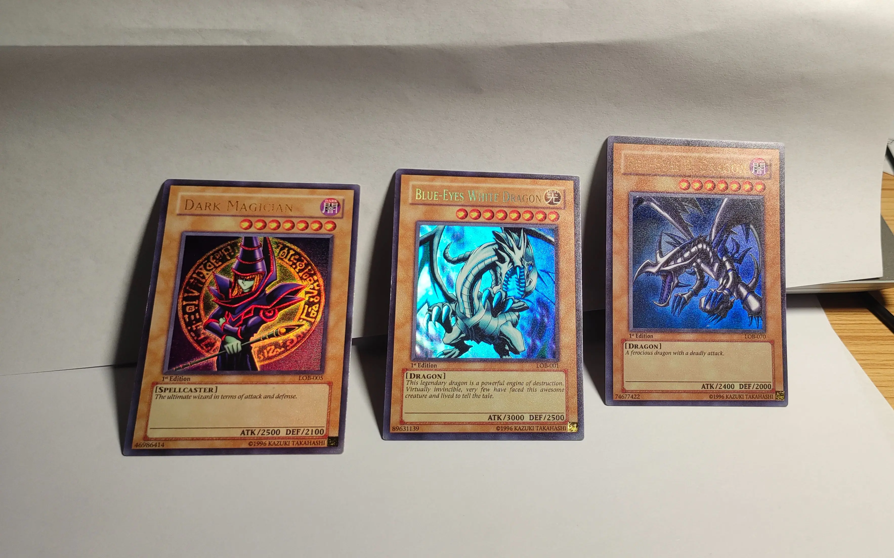 Yu gi oh Ultra Rare LOB 001/Blue Eye White Dragon Red Eye Black Dragon