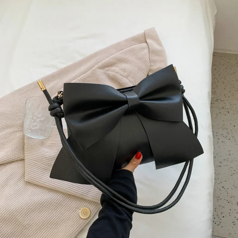 

Роскошные дизайнерские сумки для женщин, простая модная дамская однотонная сумка с милым бантом и клапаном, женские кожаные сумки через плечо
