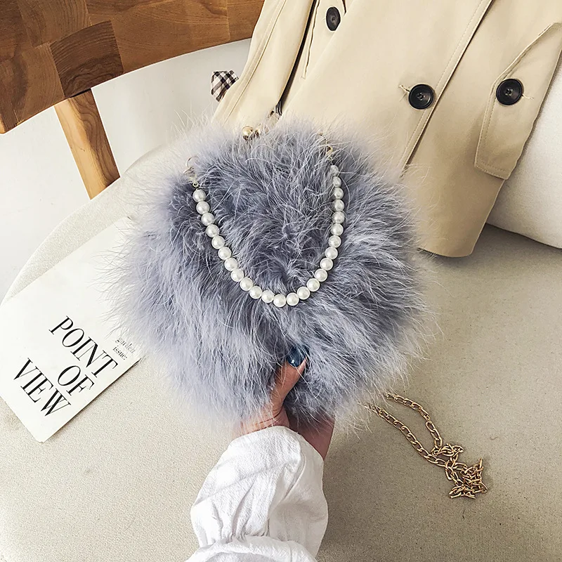 

2022 new luxury handbag fur wrap Turkey wool wrap pearl hand Bill of lading shoulder diagonal cross-chain dinner small round bag