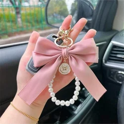 Elegant Keychain Accessory Set with Decorative Bow and Versatile Bag Ornament (Pink)