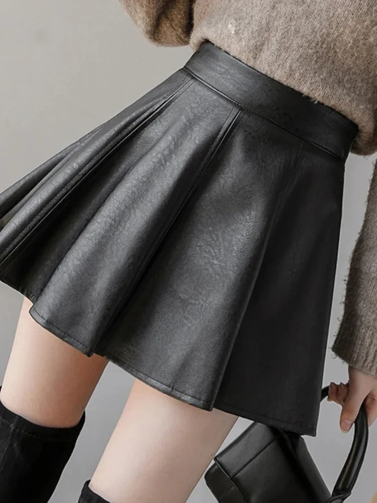 가을 패션 여성 솔리드 컬러 PU Pleated 스커트 겨울 슬림 맞는 높은 허리 독특한 지퍼가 달린 여성 미니 가죽 스커트