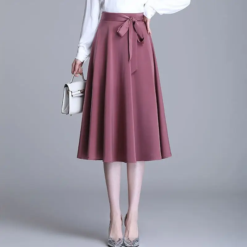 2025 Autunno New Office Lady Semplicità Allacciatura a vita alta Gonna a trapezio Donna Moda coreana Arco Gonna a pieghe tinta unita Donna 3