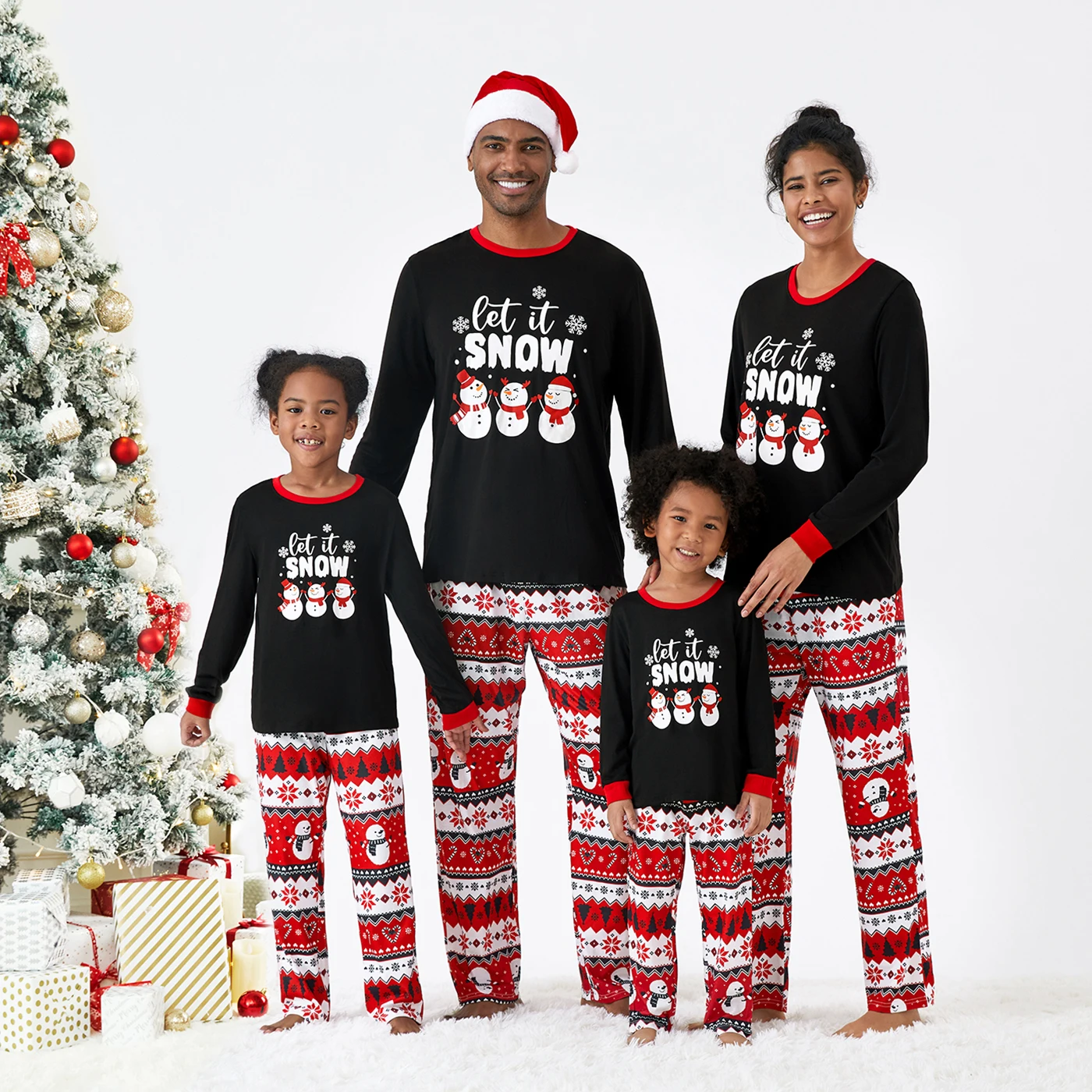 thumbnail image 1 of Conjuntos de pijamas a juego para toda la familia con estampado de letras navideñas y muñecos de nieve (resistentes al fuego), 1 of 5