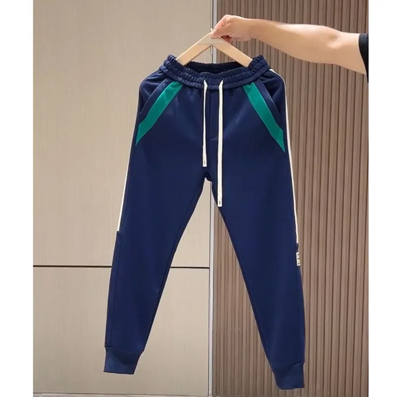 New Autumn Fashion Trend Elastic and Tight Stripe Panel Contrast Slim Fit Strap, Versatile and Handsome Youth Casual Guard Pants