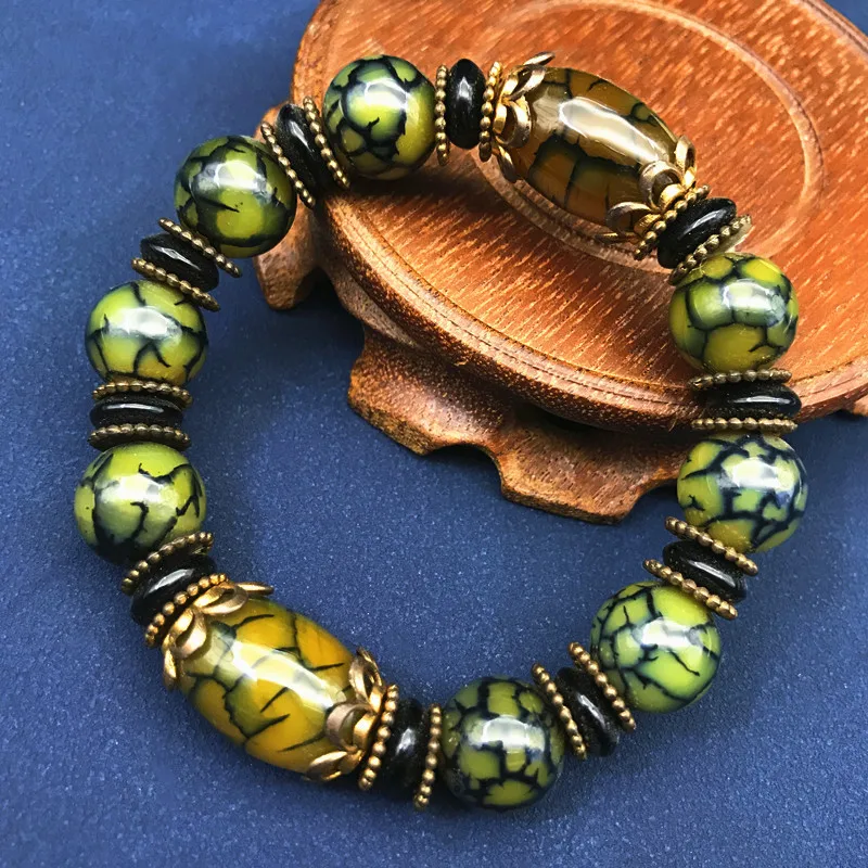 

Браслет с большими бусинами из тибетского агата Sardonyx