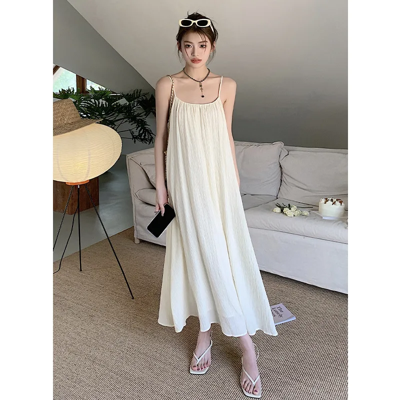 

2024 Summer New Vacation Style Spaghetti Strapless Long Dress Simple French Exquisite Loose Large Hem Sling Beach Dress