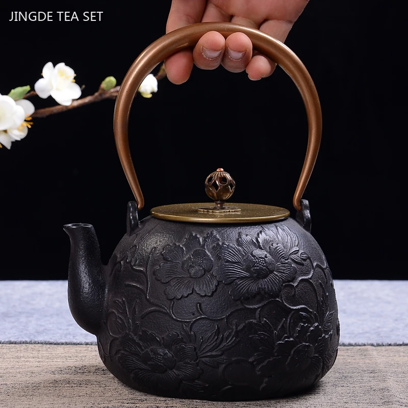 https://ae01.alicdn.com/kf/S9006513d8fc145d5993a1937ca987ed3b/900ml-Customized-Cast-Iron-Tea-Pot-Japanese-Antique-Craft-Iron-Teapot-with-Filter-Screen-Kettle-Kitchen.jpg
