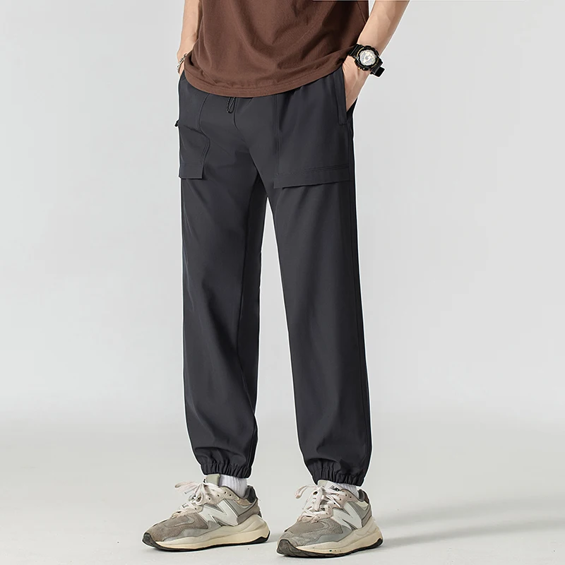 2024 Summer Mens Mountaineering Pants Waterproof and Breathable Zipper Pocket Design Straight Pants Outdoor Running Sports Pants