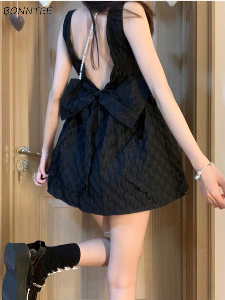 

Шикарные мини-платья на бретелях-спагетти с открытой спиной и бантом, женское модное однотонное простое свободное элегантное молодежное популярное платье для дам Ins
