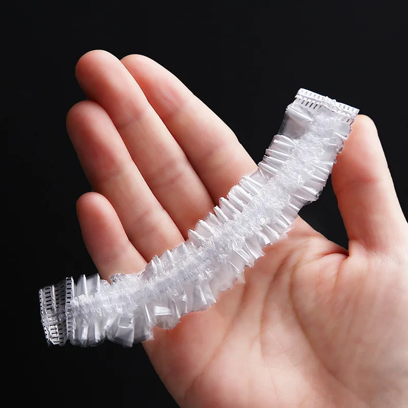 

100 pcs Waterproof PE Disposable Shower Caps Barbershop Hotel Beauty Salon Hair Dressing Dyeing One-Off Elastic Bath Caps
