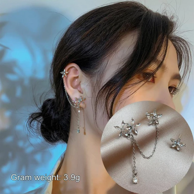 Share more than 153 wearing two different earrings meaning latest