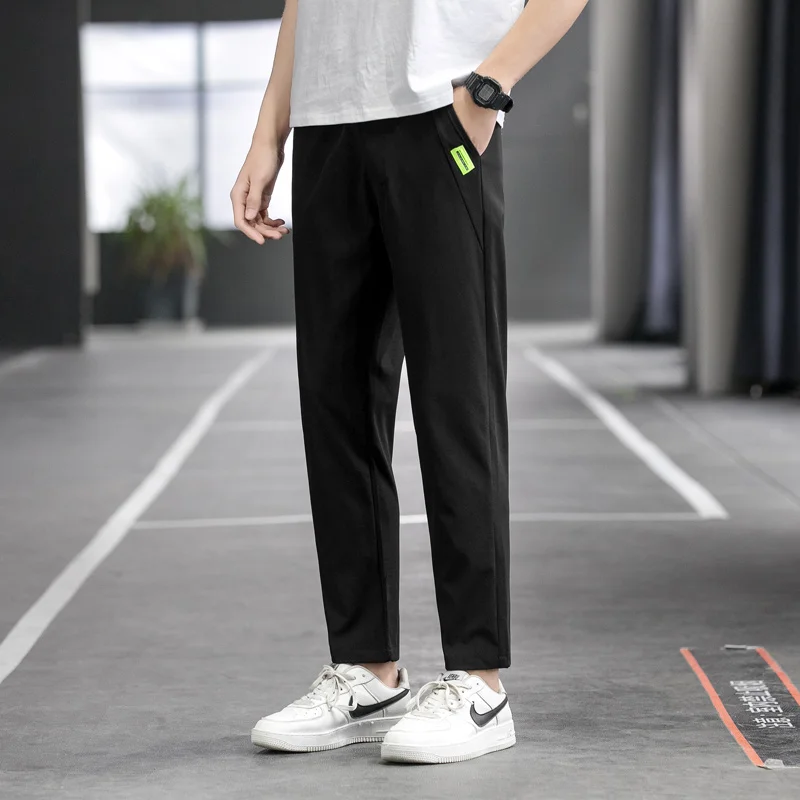 Men's Spring Autumn Elastic Casual High Waist Solid Pockets Letter Patch Casual Harlan Feet Trousers Cargo Office Lady Pants