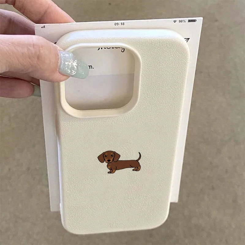 Minimalist brown dachshund dog printed pattern on multi-color soft matte TPU protective phone cases.
