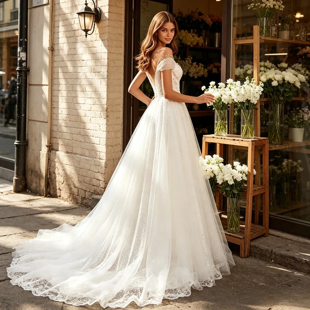 Abiti da Sposa Personalizzati Romantici con Spalle Scoperte e Perline in Tulle 2026 Nuovo Elegante Abito da Sposa a Trapezio con Perline, Balze e Ricami - immagine 2