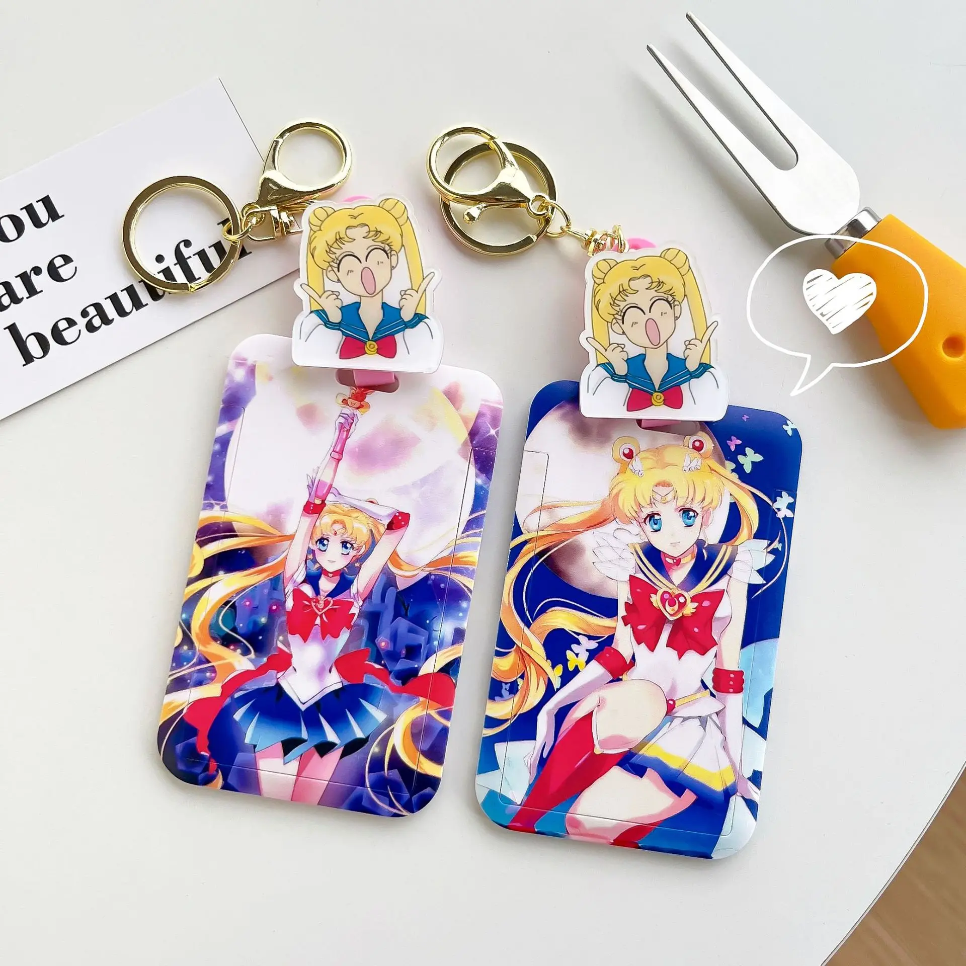 https://ae01.alicdn.com/kf/S90f1c669a13e4224988e3e18a1b46cdfV/Cartoon-Anime-Sailor-Moon-PVC-Card-Cover-Student-Campus-Hanging-Neck-Bag-Card-Holder-Lanyard-ID.jpg