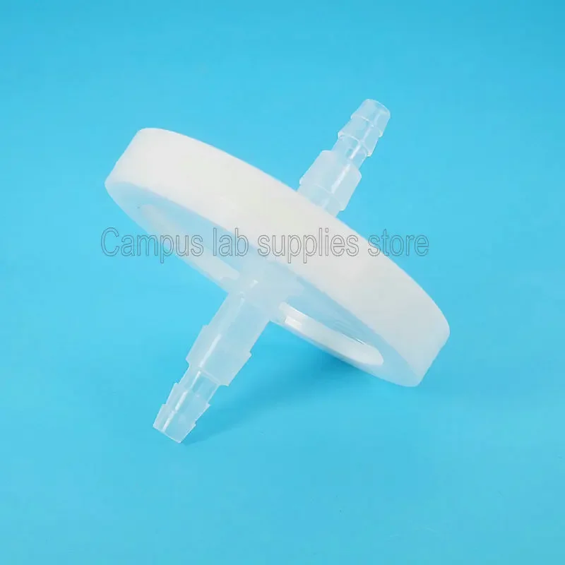 Filtre bactérien PTFE 0.22µm 50mm posé sur une surface propre, vue de dessus montrant la membrane plissée.