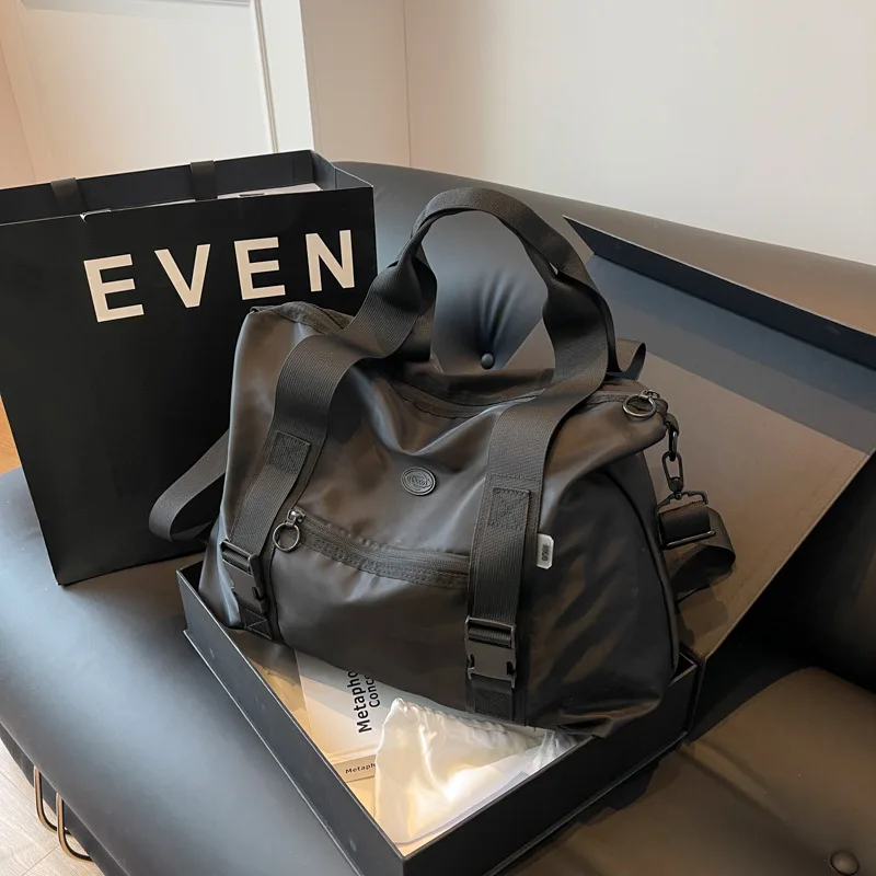 Travel bag Large capacity men's and women's fitness bag advanced sense waterproof travel handbag go out clothes duffel bag