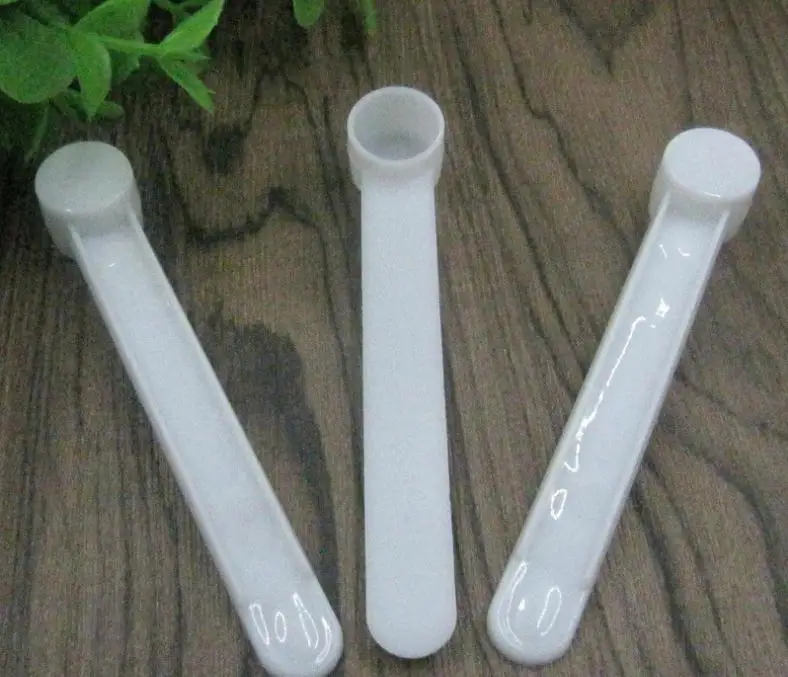 

Free shipping 1 gram Plastic Measuring Scoop 2ML Small Spoon 1g Measure Spoons White Clear Milk Protein Powder Scoops SN1975