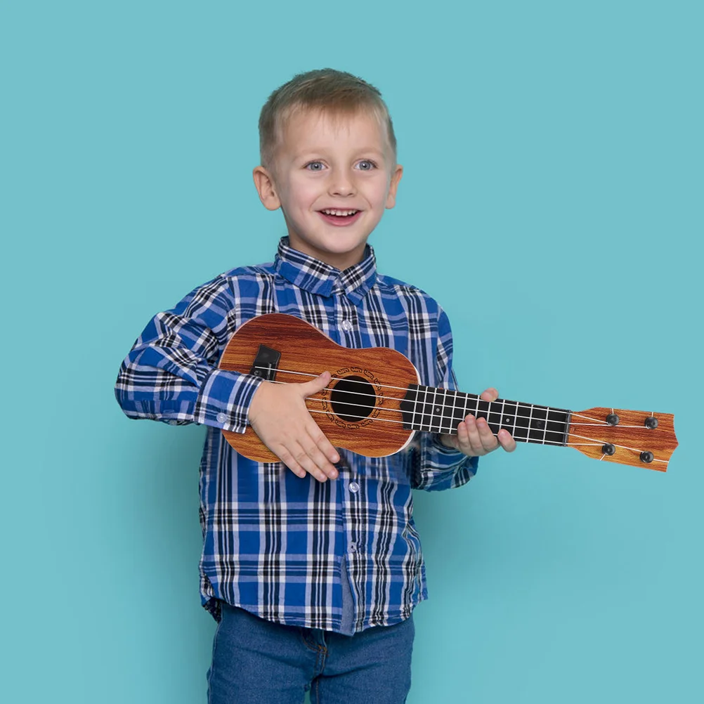 Ukulele Girls Early Education Kids Musical Learning Guitar Model Ukulele girls early education kids musical learning guitar model