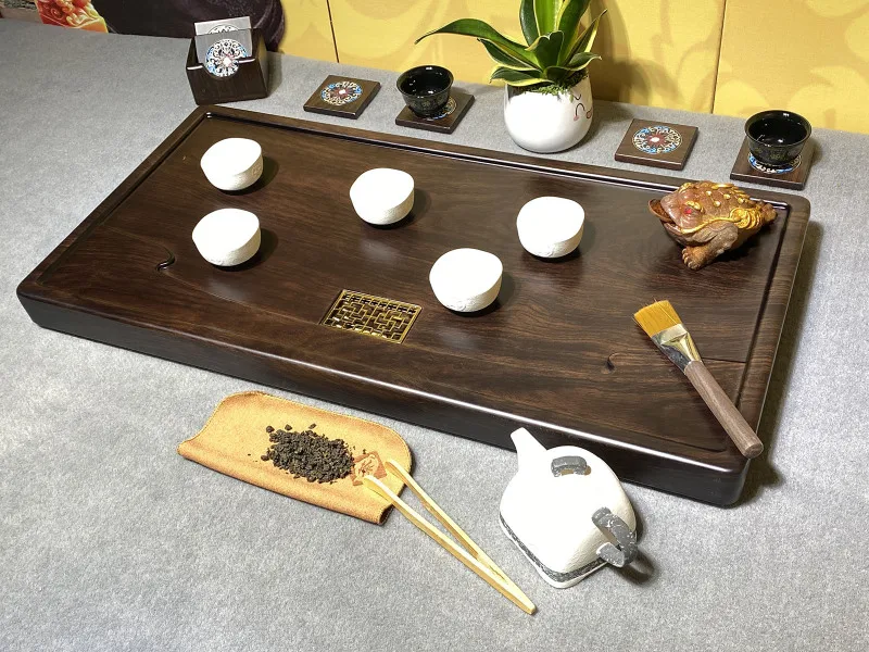 

Whole ebony tea tray Guanhai solid wood tea tray 70*35*4.5 log tea sea tea table