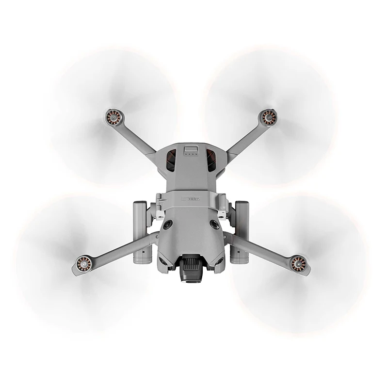 Drone DJI Mini 4 Pro équipé du projecteur LED rechargeable, éclairage nocturne visible à distance.