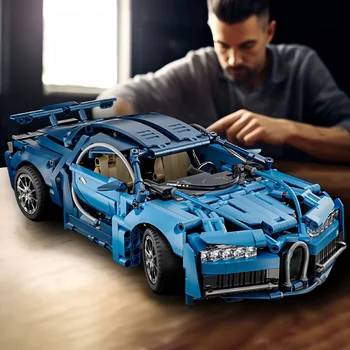 This Sleek Blue Car Building Kit Consists of 1608 Pieces and Forms a Model It's a Stylish Car Show Collectible, Offering an Immersive Experience. 1