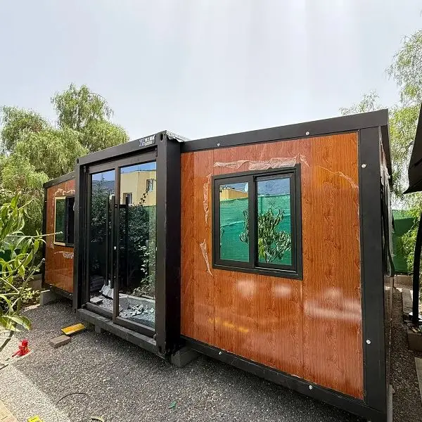 บ้านสำเร็จรูปแบบพกพาขนาด 20 ฟุต 40 ฟุต ผลิตตามสั่งจากโรงงาน บ้านคอนเทนเนอร์พับได้แบบเคลื่อนย้ายได้ขนาด 40 ฟุต สำหรับออสเตรเลีย 1