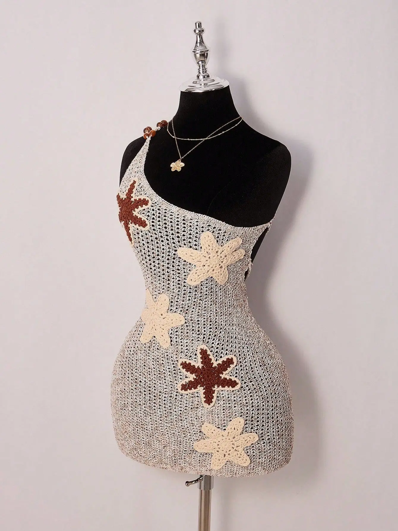 close-up of the crochet texture and appliqué accents