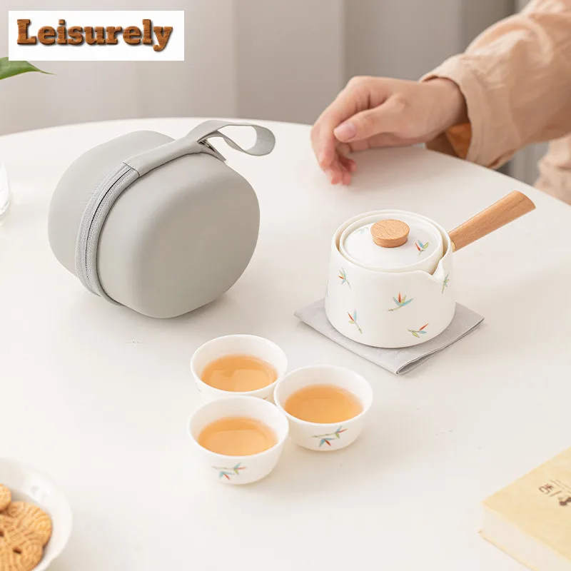 Leisurely Bamboo Ceramic Travel Tea Set Kit 360 Rotation Tea Maker Automatic Tea Set Designer 1 Pot 3 Cups Portable Picnic Bag