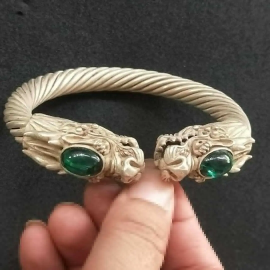 

Old Chinese tibet silver inlay green jade carved dragon head Bracelet