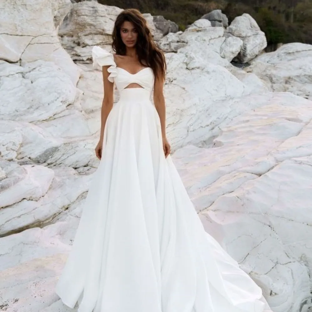 

Princess Ruffles Spaghetti Straps Beach Wedding Dresses Sweetheart Cut-out Bridal Dress A-line Sweep Train Bride Gown 2023